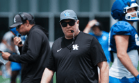 Kentucky Head Coach Mark Stoops instructs the team during practice at the Joe Craft football practice field in Lexington, Ky. on Aug. 1, 2025. (© Sam Upshaw Jr./Courier Journal / USA TODAY NETWORK via Imagn Images)