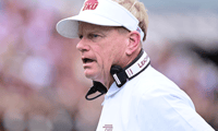 Aug 31, 2024; Starkville, Mississippi, USA; Eastern Kentucky Colonels head coach Walt Wells stands on the sideline during the first quarter of the game against the Mississippi State Bulldogs at Davis Wade Stadium at Scott Field. Mandatory Credit: Matt Bush-Imagn Images