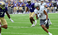 Sep 7, 2024; Seattle, Washington, USA; Eastern Michigan Eagles wide receiver Terry Lockett Jr. (3) carries the ball after a catch against the Washington Huskies during the first half at Alaska Airlines Field at Husky Stadium. Mandatory Credit: Steven Bisig-Imagn Images