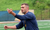 West Virginia wide receivers coach Ryan Garrett