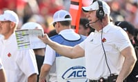 Oct 4, 2025; Louisville, Kentucky, USA; Louisville Cardinals head coach Jeff Brohm calls out instructions during the second quarter against the Virginia Cavaliers at L&N Federal Credit Union Stadium. Virginia defeated Louisville 30-27. Mandatory Credit: Jamie Rhodes-Imagn Images