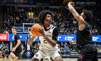 West Virginia freshman guard Amir Jenkins