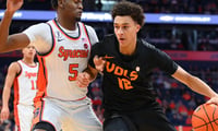 Dec 2, 2025; Syracuse, New York, USA; Tennessee Volunteers forward Nate Ament (10) drives against Syracuse Orange forward Tyler Betsey (5) during the first half at the JMA Wireless Dome. Mandatory Credit: Rich Barnes-Imagn Images
