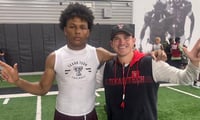Josiah Walker with Texas Tech assistant coach Garret McGuire