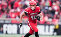 Louisville Cardinals running back Braxton Jennings (46) runs for a gain against Kentucky as the Louisville Cardinals football team dominated the Wildcats 41-0 Saturday, November 29, 2025 in Louisville, Kentucky at L&N Federal Credit Union Stadium.