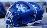 Kentucky football helmet on the sideline, via Dr. Michael Huang, KSR