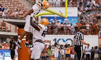 UTEP’s Mark Robinson (66) celebrates Shay Smith’s (8) touchdown during a game against Texas at Darrell K Royal–Texas Memorial Stadium in Austin, Texas, on Saturday, Sept. 13, 2025. © Gaby Velasquez / El Paso Times / USA TODAY NETWORK via Imagn Images
