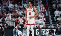 Louisville Cardinals guard Mikel Brown Jr. (0) celebrates after hitting a three-point goal against NC State at the KFC Yum! Center in downtown Louisville February 9, 2026.