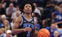 Nov 21, 2025; Salt Lake City, Utah, USA; BYU Cougars guard Robert Wright III (1) brings the ball up the court against the Wisconsin Badgers during the second half at Delta Center. Mandatory Credit: Rob Gray-Imagn Images