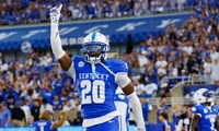 Sep 13, 2025; Lexington, Kentucky, USA; Kentucky Wildcats defensive back Terhyon Nichols (20) celebrates after linebacker Daveren Rayner intercepts a pass during the first quarter against the Eastern Michigan Eagles at Kroger Field. Mandatory Credit: Jordan Prather-Imagn Images