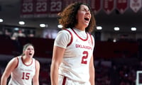 Aaliyah Chavez (2) cheers after a basket and foul during the women's college basketball game between the Oklahoma Sooners and the South Carolina at the Lloyd Noble Center in Norman, Okla., Thursday Jan. 22, 2026.