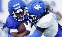 WR Hardley Gilmore tackled by Braxton Urquhart at Kentucky Spring Practice, via UK Athletics