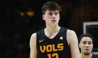 Tennessee sophomore power forward Nate Estrella has officially signed with Michigan. (USA Today Sports photos)
