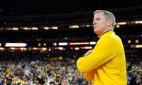 Michigan Wolverines basketball head coach Dusty May taking in the scene after winning the national championship. (Photo by Junfu Han / USA TODAY NETWORK via Imagn Images)