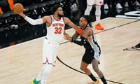 Jun 3, 2026; San Antonio, Texas, USA; New York Knicks center Karl-Anthony Towns (32) controls the ball against the San Antonio Spurs during the third quarter during game one of the 2026 NBA Finals at Frost Bank Center. Mandatory Credit: Scott Wachter-Imagn Images
