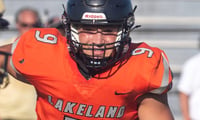 Lakeland defensive end Drew Sapp chases down Gainesville quarterback Andrew Whittemore.
