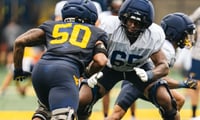 West Virginia offensive lineman Malik Agbo