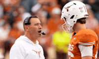 Texas coach Steve Sarkisian, QB Arch Manning