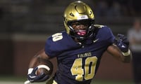Spartanburg Vikings Trenton Lynch (40) rushes the ball Friday, Sept. 5, 2025 during the SCHSL football game against the Broome