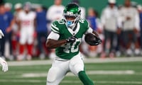Aug 28, 2026; East Rutherford, New Jersey, USA; New York Jets running back Chip Trayanum (40) carries the ball against the New York Giants during the first half at MetLife Stadium. Mandatory Credit: Vincent Carchietta-Imagn Images