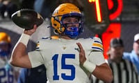 Battle Ground's Bo Bryan (15) throws the ball during a TSSAA high school football playoff game between Grace Christian and