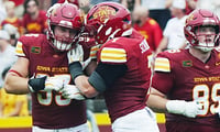 Iowa State defensive end Jack Janikowski (93) celebrates with Iowa State linebacker Sullivan Schlimgen (7) after a tackle