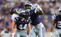 Kansas State Wildcats linebacker Darien Whitaker (6) reacts after recovering the ball during the game against Nicholls Colonels