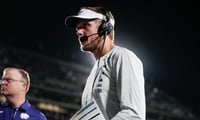 Kansas State Wildcats head coach Collin Klein talks to radio after a 71-3 victory over Nicholls Colonels inside Bill Snyder