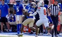 2026-09-05T235920Z_901370413_MT1USATODAY29751894_RTRMADP_3_TULSA-WIDE-RECEIVER-ORAN-SINGLETON-2-CATCHES-A-PASS-WHILE