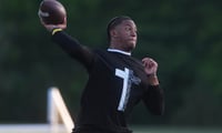 Lausannes Thomas Heffner throws a pass during a drill at spring practice at the school in Memphis, Tenn., on April 22, 2026.