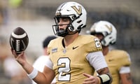 Vanderbilt quarterback Jared Curtis (2) warms up before a game against Delaware at FirstBank Stadium in Nashville, Tenn.,