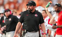 2026-09-18T012434Z_803470901_MT1USATODAY29844058_RTRMADP_3_OHIO-STATE-BUCKEYES-HEAD-COACH-RYAN-DAY-WATCHES-FROM-THE (1)