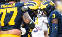 2026-09-20T010305Z_1748557959_MT1USATODAY29866346_RTRMADP_3_MICHIGAN-WOLVERINES-RUNNING-BACK-SAVION-HITER-5-AND-WIDE