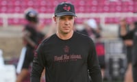 Texas Tech offensive coordinator Mack Leftwich walks the field before a Big 12 Conferencd football game, Friday, Sept. 18 2026,