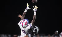 Bartletts Pierce Washington (0) jumps to catch a pass for a first down during the game between Bartlett High School and Houston
