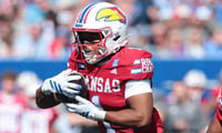 Kansas Jayhawks running back Dylan Edwards (1) runs the ball in for a touchdown against Middle Tennessee Blue Raiders during the