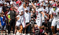 Alabama quarterback Keelon Russell (12) carries the ball for a touchdown during a college football game between Mississippi