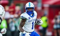 Oct 3, 2026; Columbia, South Carolina, USA; Kentucky Wildcats running back CJ Baxter (1) rushes against the South Carolina Gamecocks in the second half at Williams-Brice Stadium. Mandatory Credit: Jeff Blake-Imagn Images