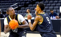 Mark Mitchell looks past CJ Gunn
