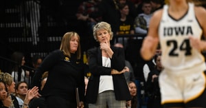 Head Coach Lisa Bluder and assistant Jenni Fitzgerald against Indiana. (Photo by Dennis Scheidt)