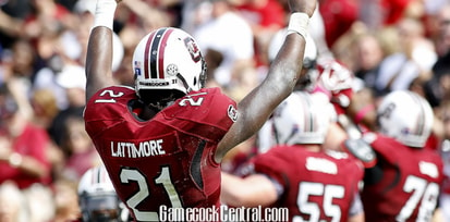 Former South Carolina running back Marcus Lattimore celebrates after a play