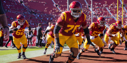 USC's Mason Murphy and the Trojans' offensive linemen warm up before a game against the San Jose State Spartans
