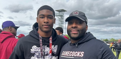 South Carolina commitment Anthony Addison is pictured with Gamecocks assistant Sterling Lucas (@DAnthonyAddison on X)