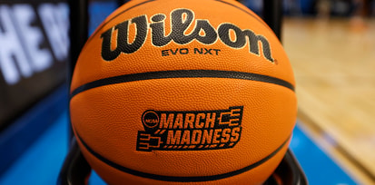 March Madness logo on a basketball in 2024