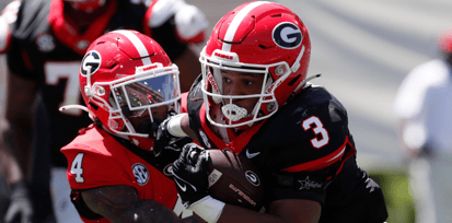 Michigan State and former Georgia running back Andrew Paul (3) throws a stiff-arm block on Georgia defensive back JK Bolden (4) during the G-Day spring football game in Athens, Ga., on Saturday, April 13, 2024 - Joshua L. Jones, USA TODAY Sports