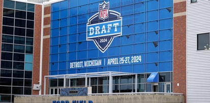 The 2024 NFL Draft logo on the Ford Field facade. The stadium is the home of the Detroit Lions. Mandatory Credit: Kirby Lee-USA TODAY Sports
