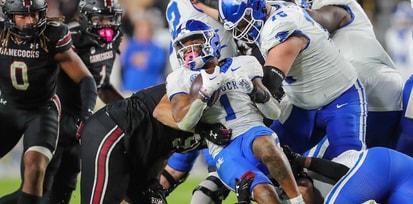 South Carolina football's defense tackles a Kentucky running back in 2023's game (Photo: CJ Driggers | GamecockCentral.com)