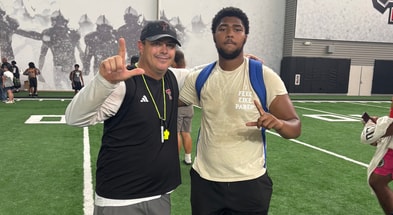 Aiden Williams with Texas Tech OL coach Clay McGuire