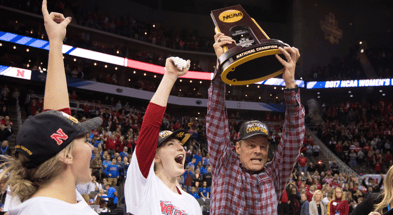 Nebraska head coach John Cook hoisting the 2017 National Championship trophy (Photo by Jamie Schwaberow/NCAA Photos via Getty Images)