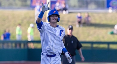 Florida Gators outfielder Jud Fabian makes great catch, slams wall